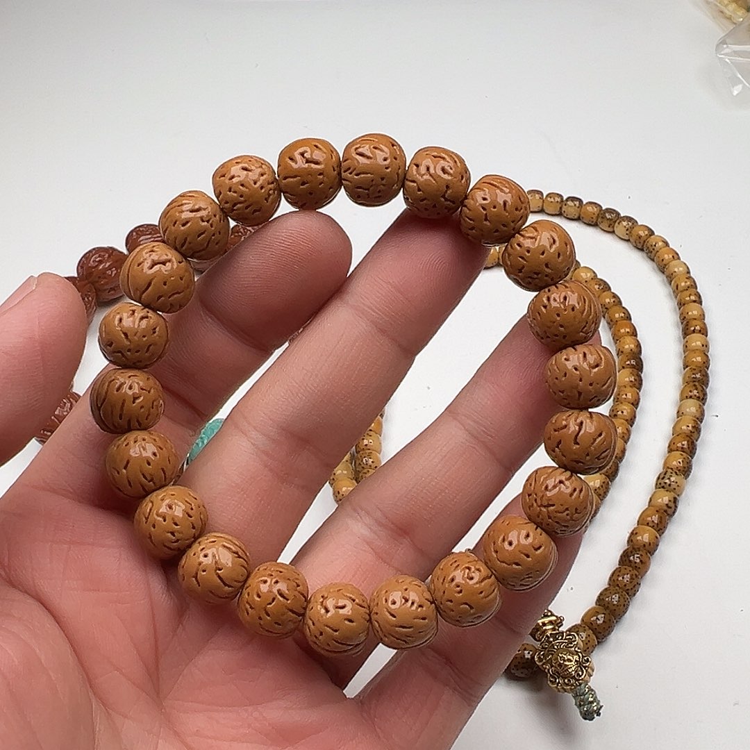 羽毛纯铜小尺寸桃核手串