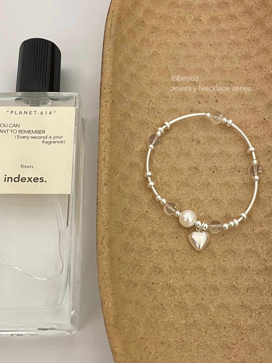 925银仿珍珠手链 爱心弹力绳手链 30483