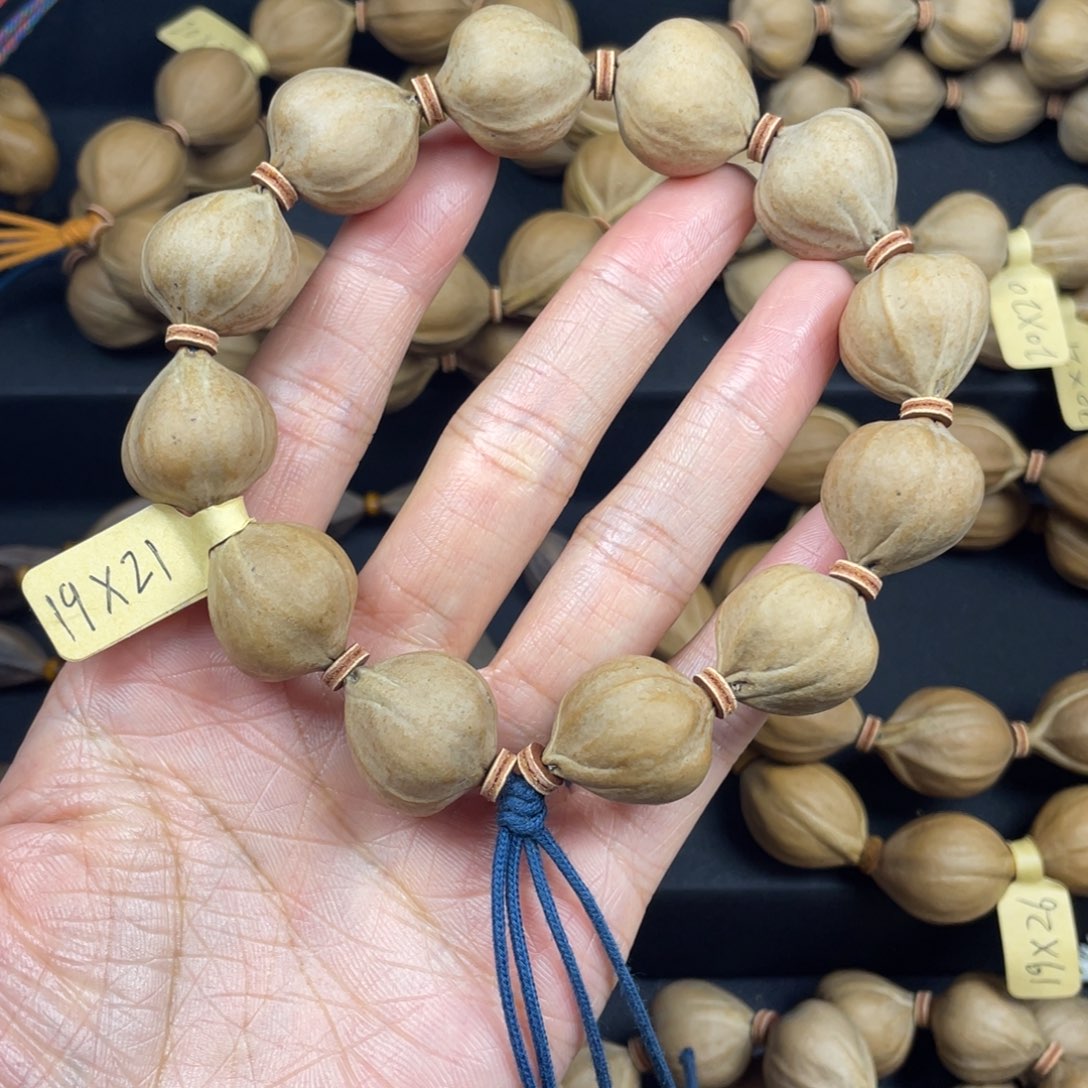锋***༽001橄榄核三花蒜头1.9*21