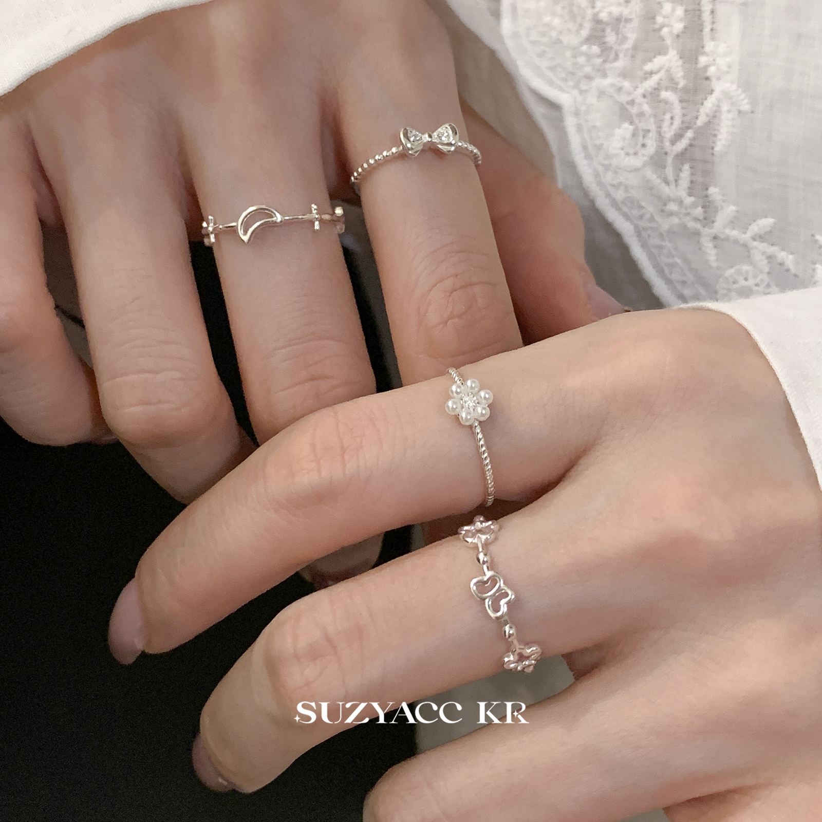 Suzyacc Kr 925银合成锆石戒指 【小花园】迷你蝴蝶结花朵戒指J0868