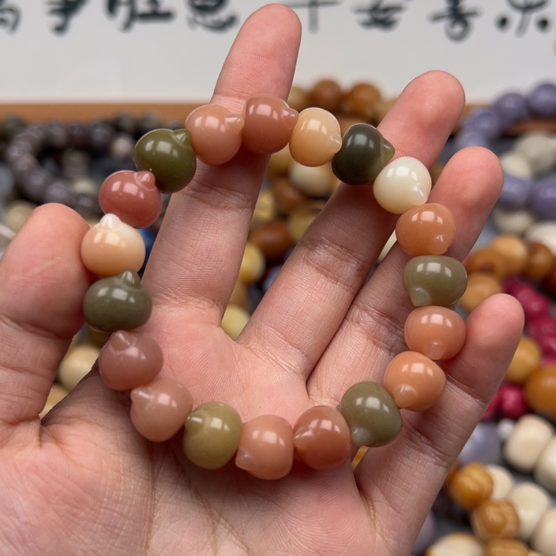 吊坠菩提根/象牙果K711猫头11-12微瑕一串