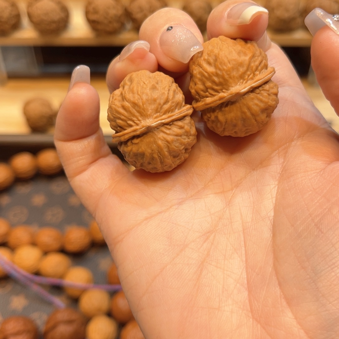 文玩核桃把件元宝手捻