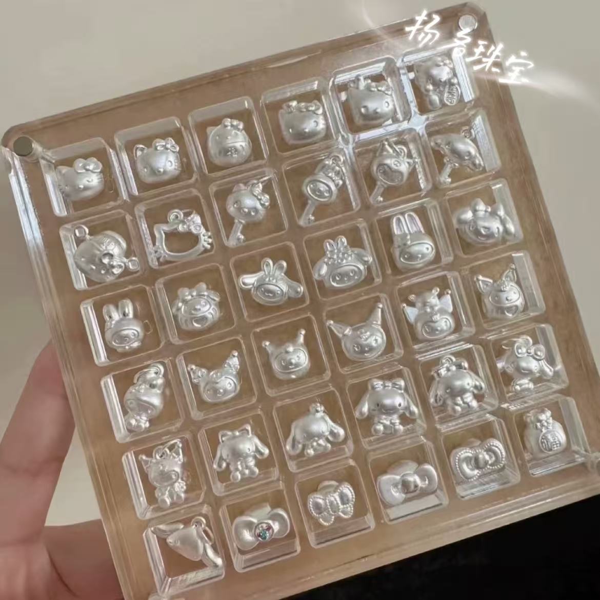 足银银制品 足银999HelloKitty玉桂狗美乐蒂蝴蝶结转运珠配件1g