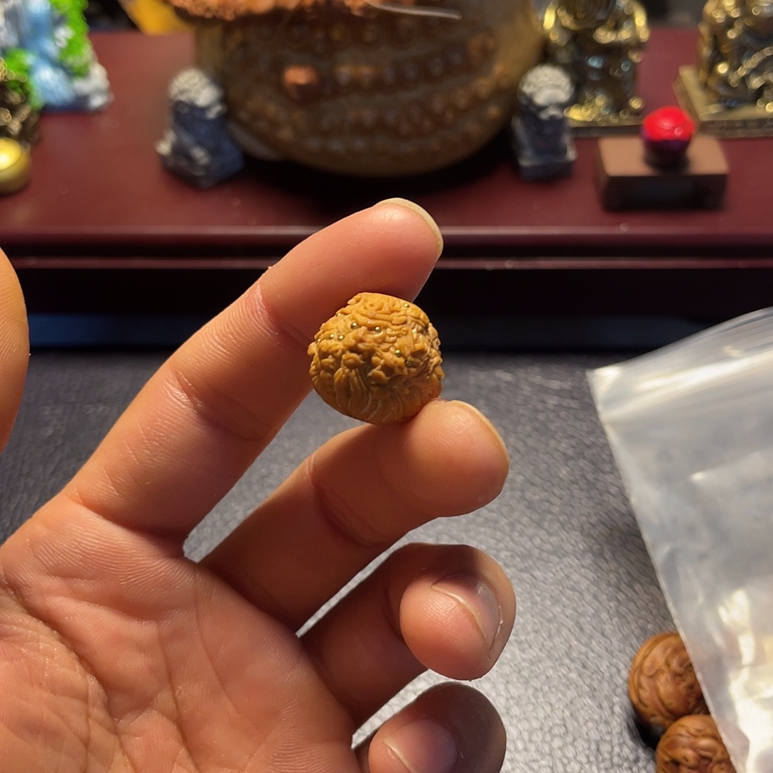 阿***九猴头核桃雕刻九灵元圣