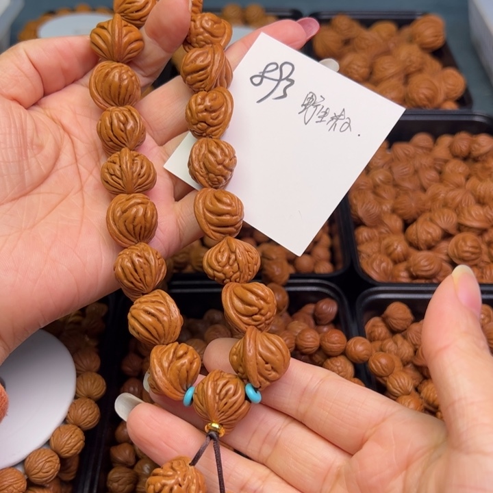 桃核把件野生籽手持