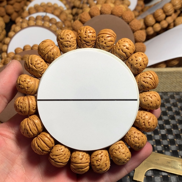 布***茶桃核手串5#树王纽扣