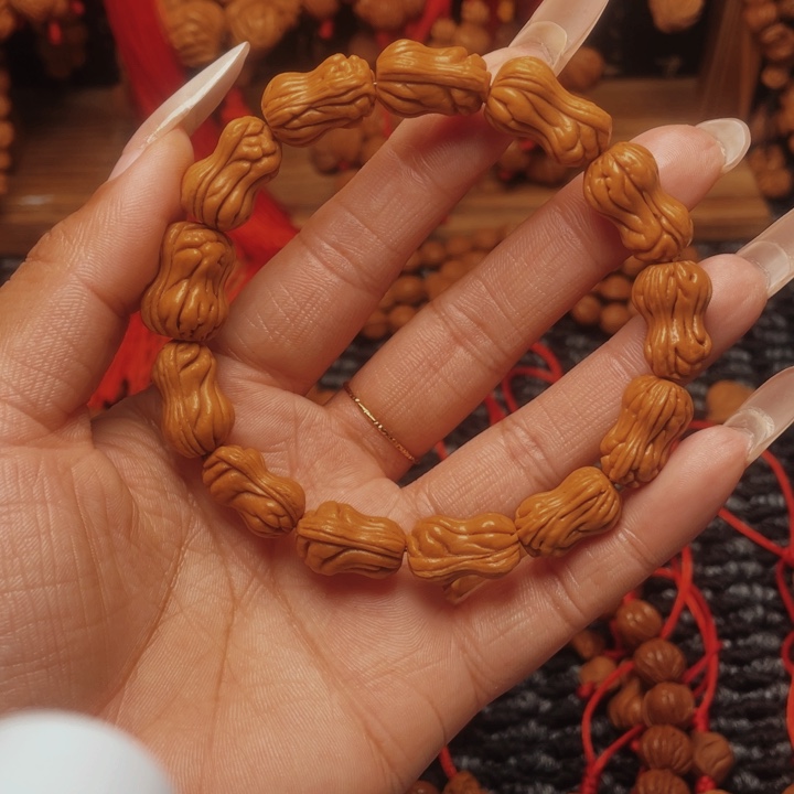 菩提籽类龙纹桃枭手串
