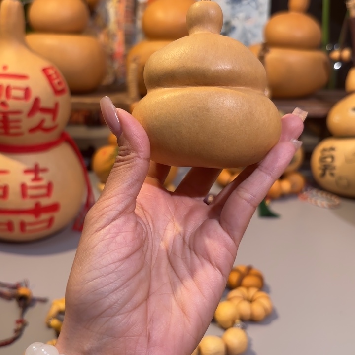 昊***哲天坛老皮钱袋摆件