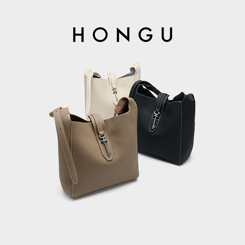 红谷2025新款单肩斜挎包气质休闲通勤大容量腋下包水桶包真皮女包