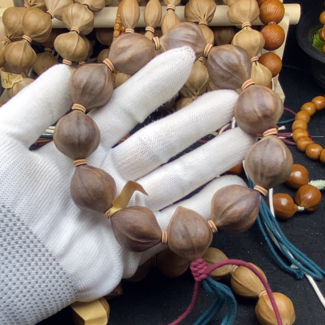 熊***祥橄榄核手串/手链2224三花紫皮11颗