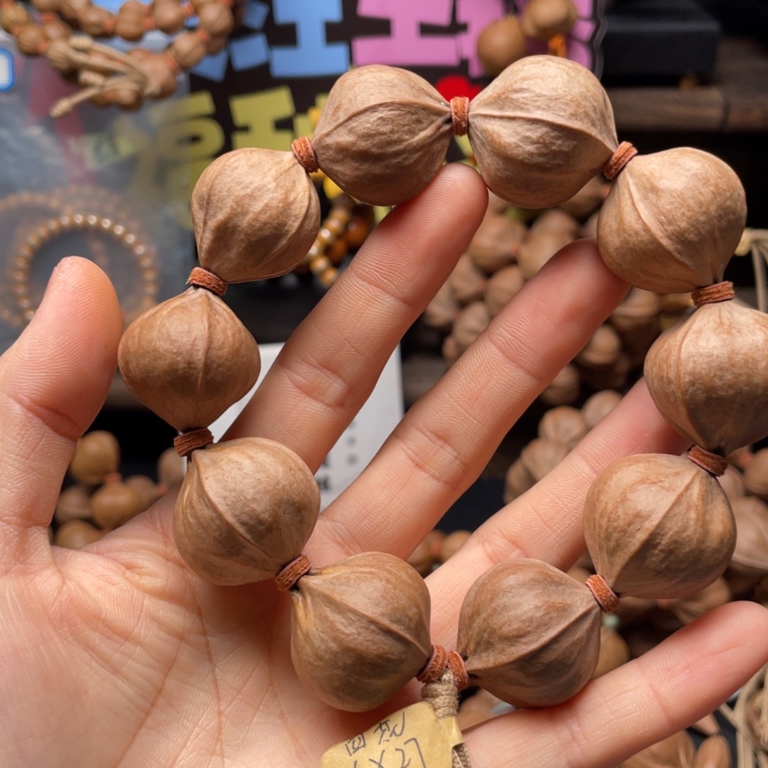 䳽***吊坠橄榄核2627四花铁核