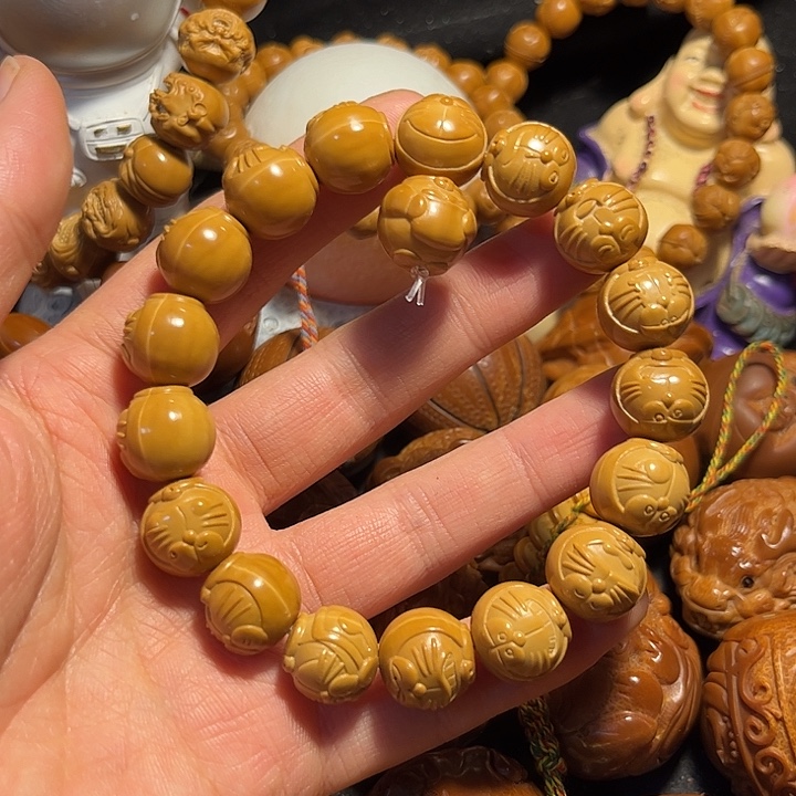 橄榄核手串/手链猴头哆啦A梦三通