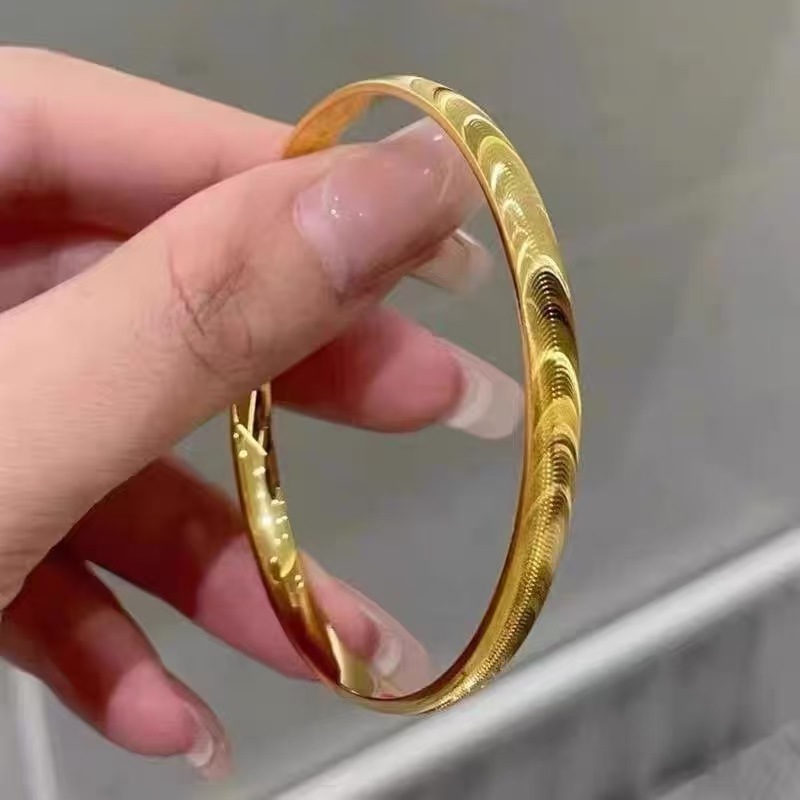 A016镭射车花猫眼手饰