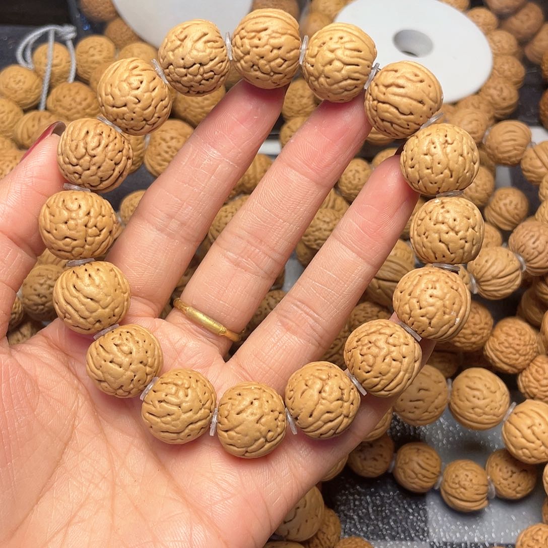 桃核手串穿**风16.8金丹手串