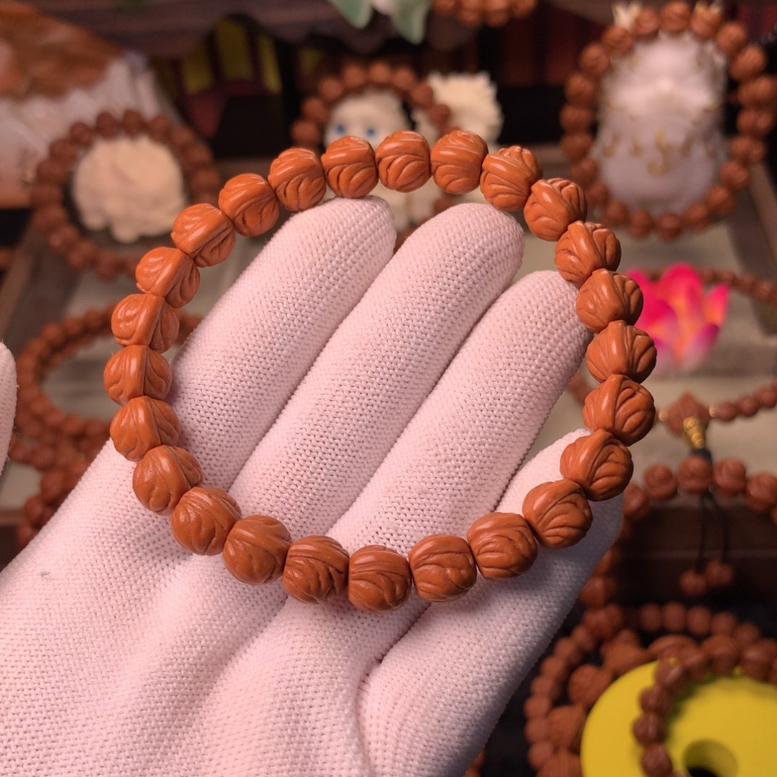 宜***柜桃核吊坠金玉龙手串10