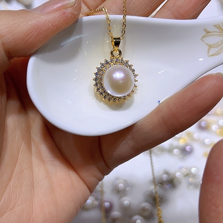 淡水珍珠白珠金色太阳花吊坠银S925镶嵌