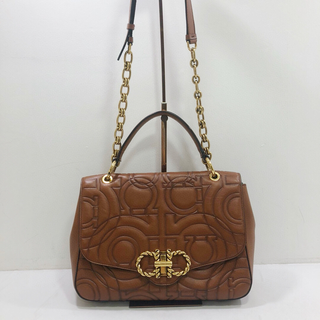 95新 FERRAGAMO/菲拉格慕 全皮棕色Gancini衔缝翻盖手提单斜挎包