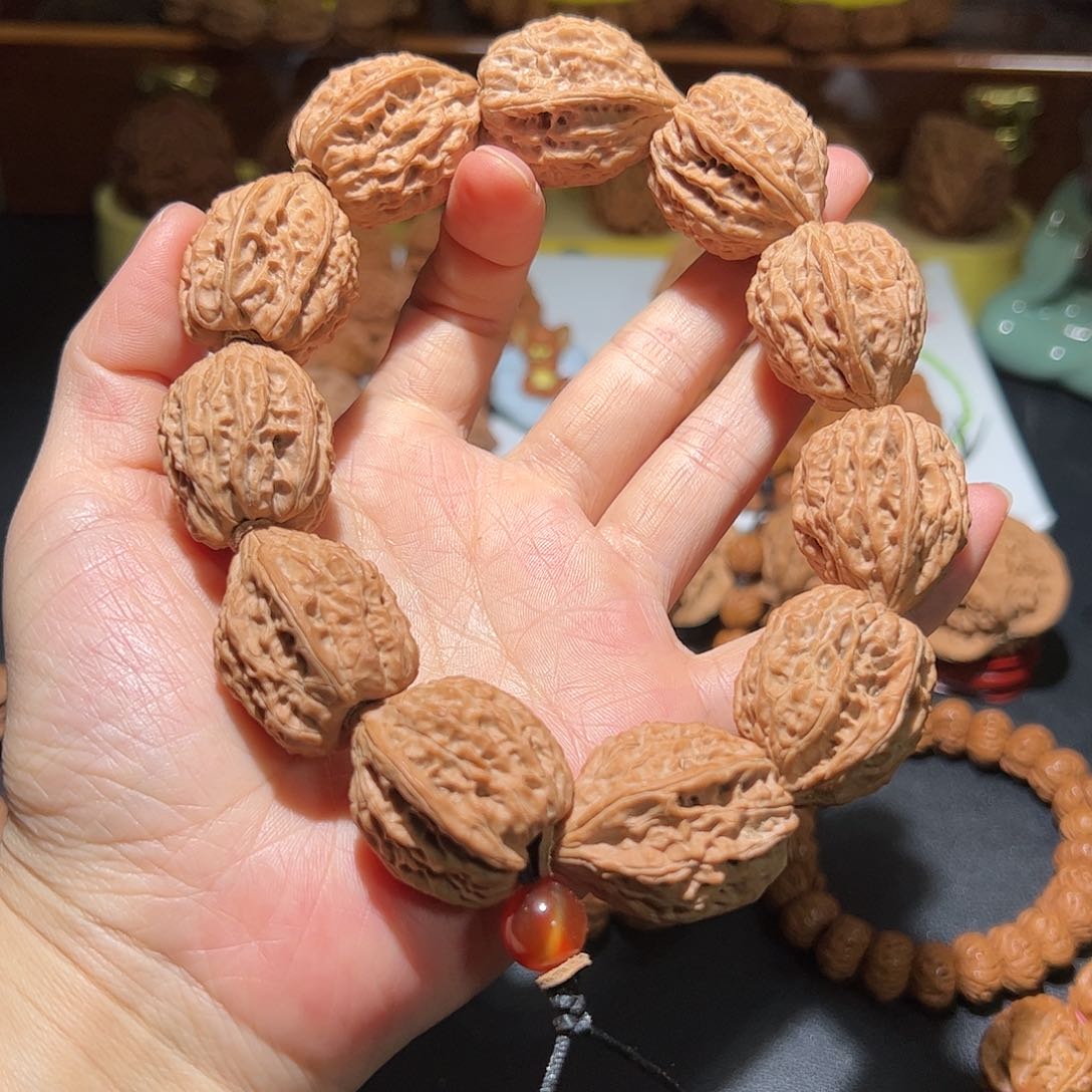 文玩核桃把件钻山鼠野生鸡心手持