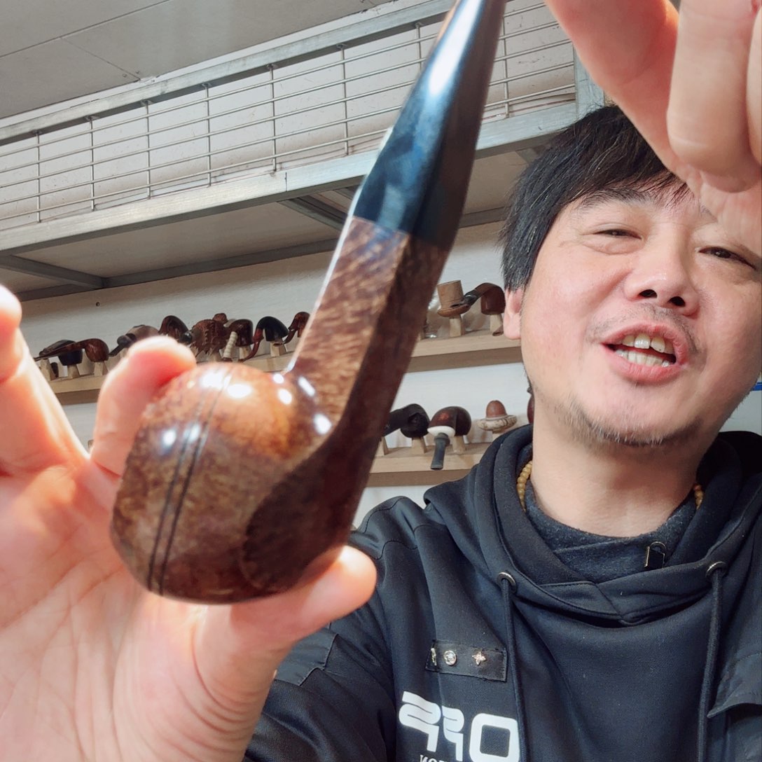 ?***人焦耀烟斗一牛头