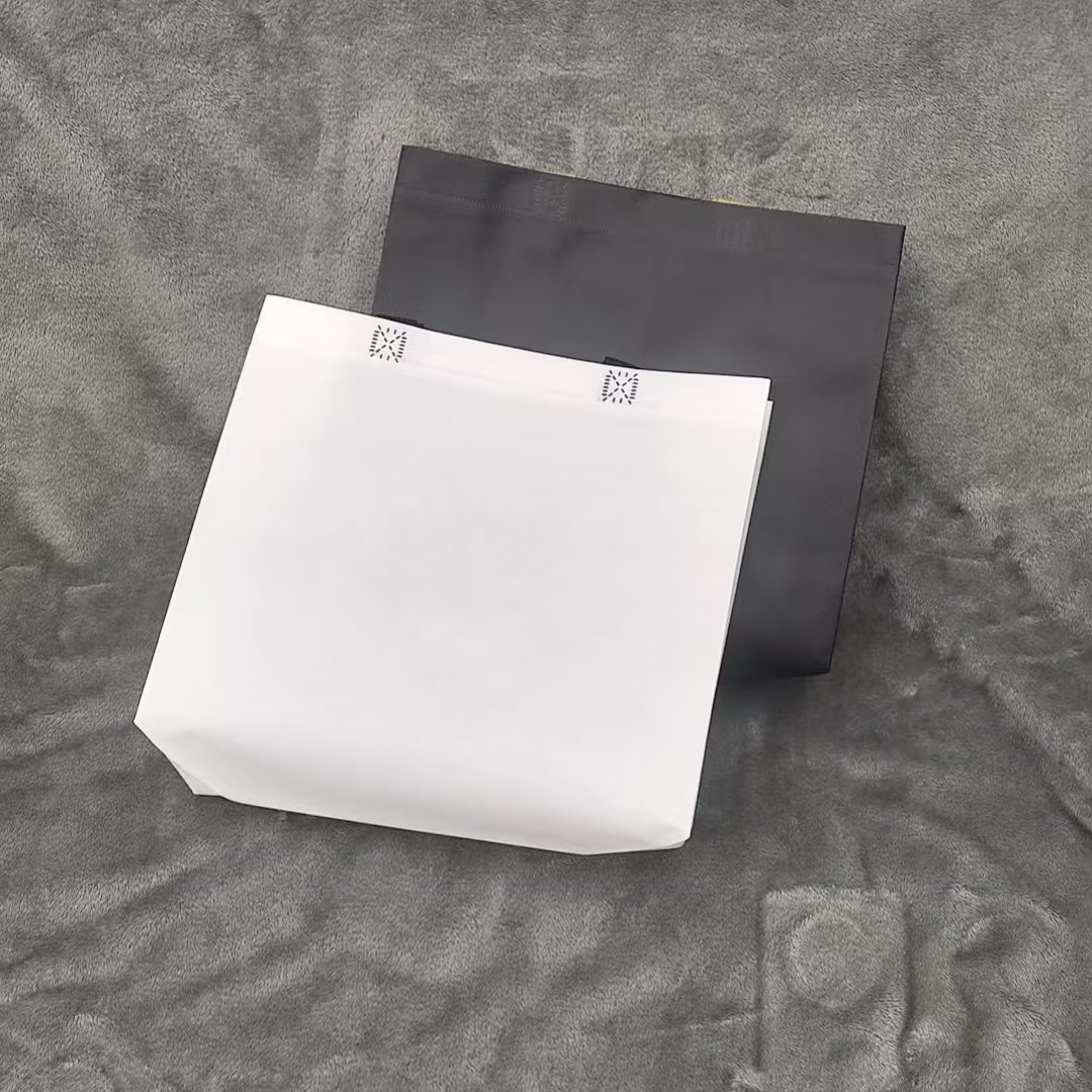 覆膜款纯色无纺布服装包装袋立体袋可以定制两单以上送店名贴