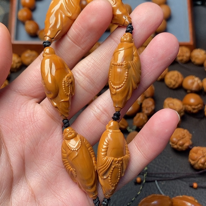 【闪购商品】橄榄核吊坠七**光橄榄核