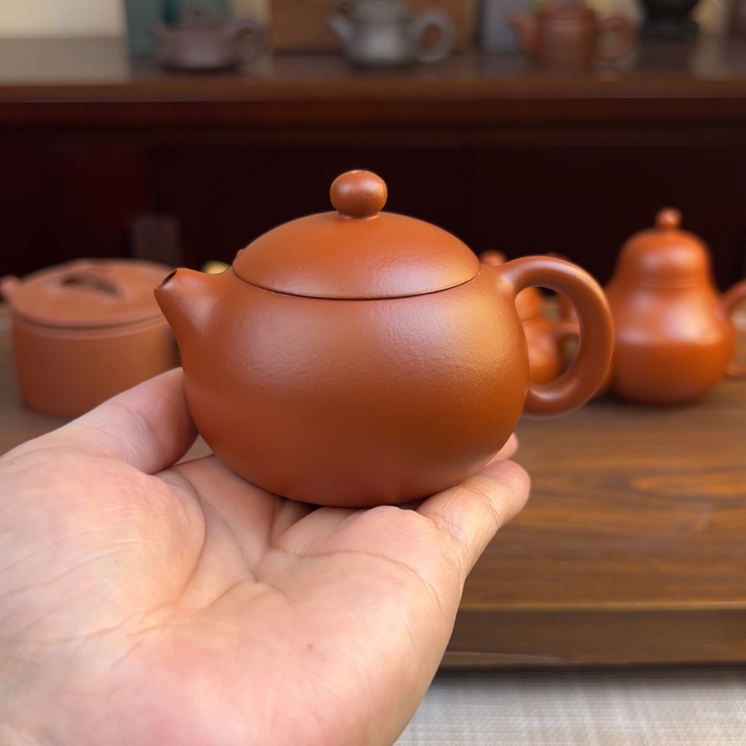 紫砂茶壶朱泥西施半手微瑕110cc