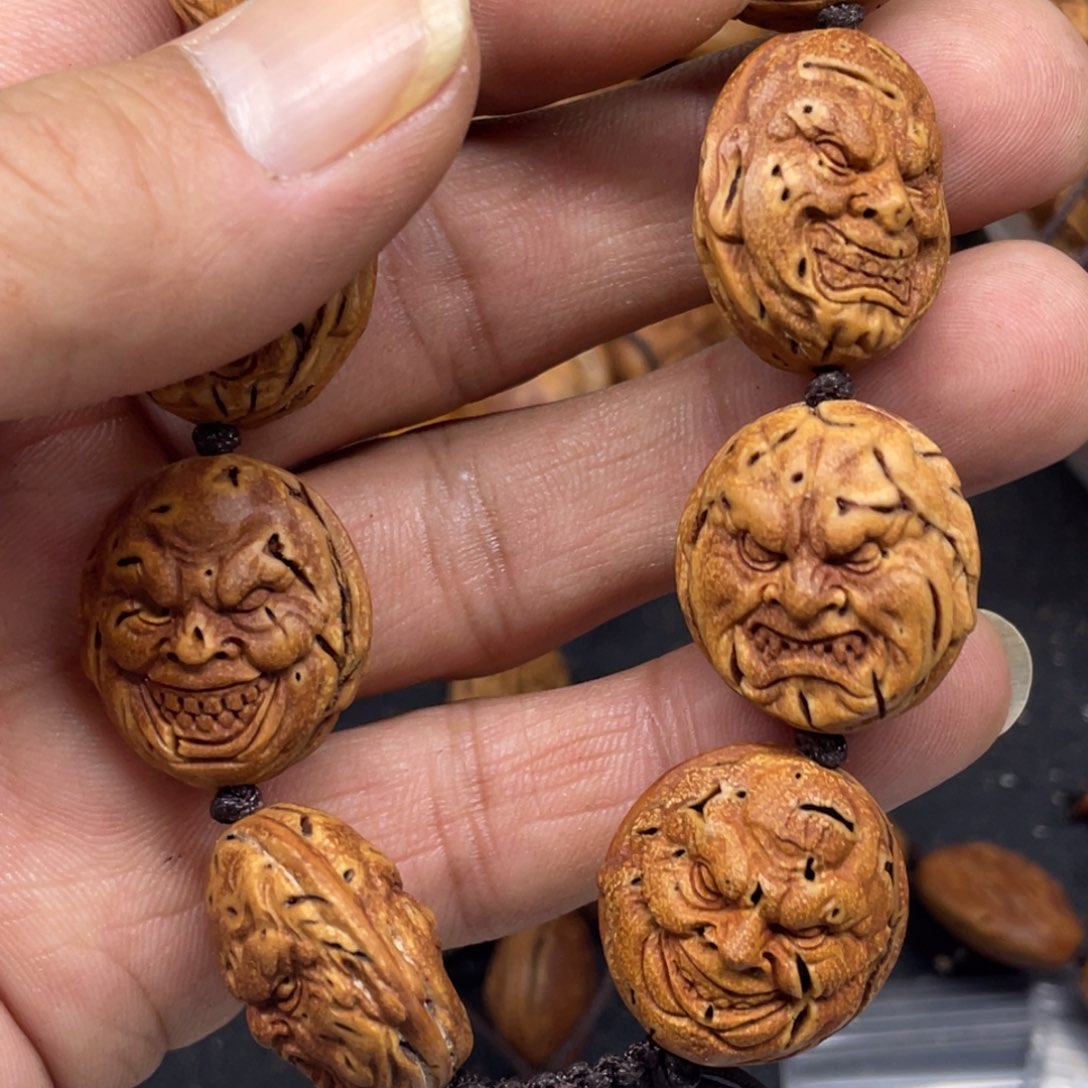 唐***猴桃核雕刻双面恶僧