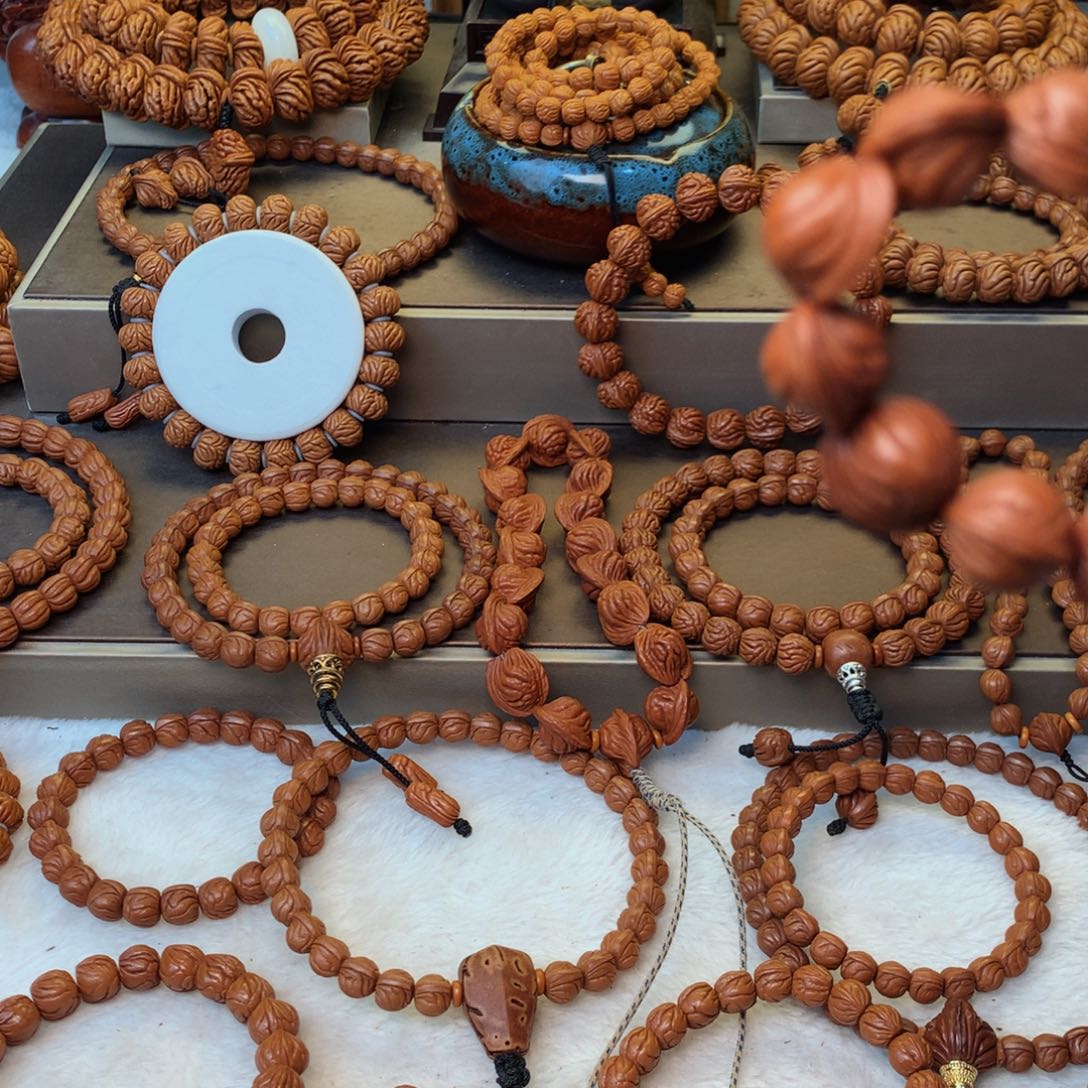 爱***桃核手串秦岭龙纹