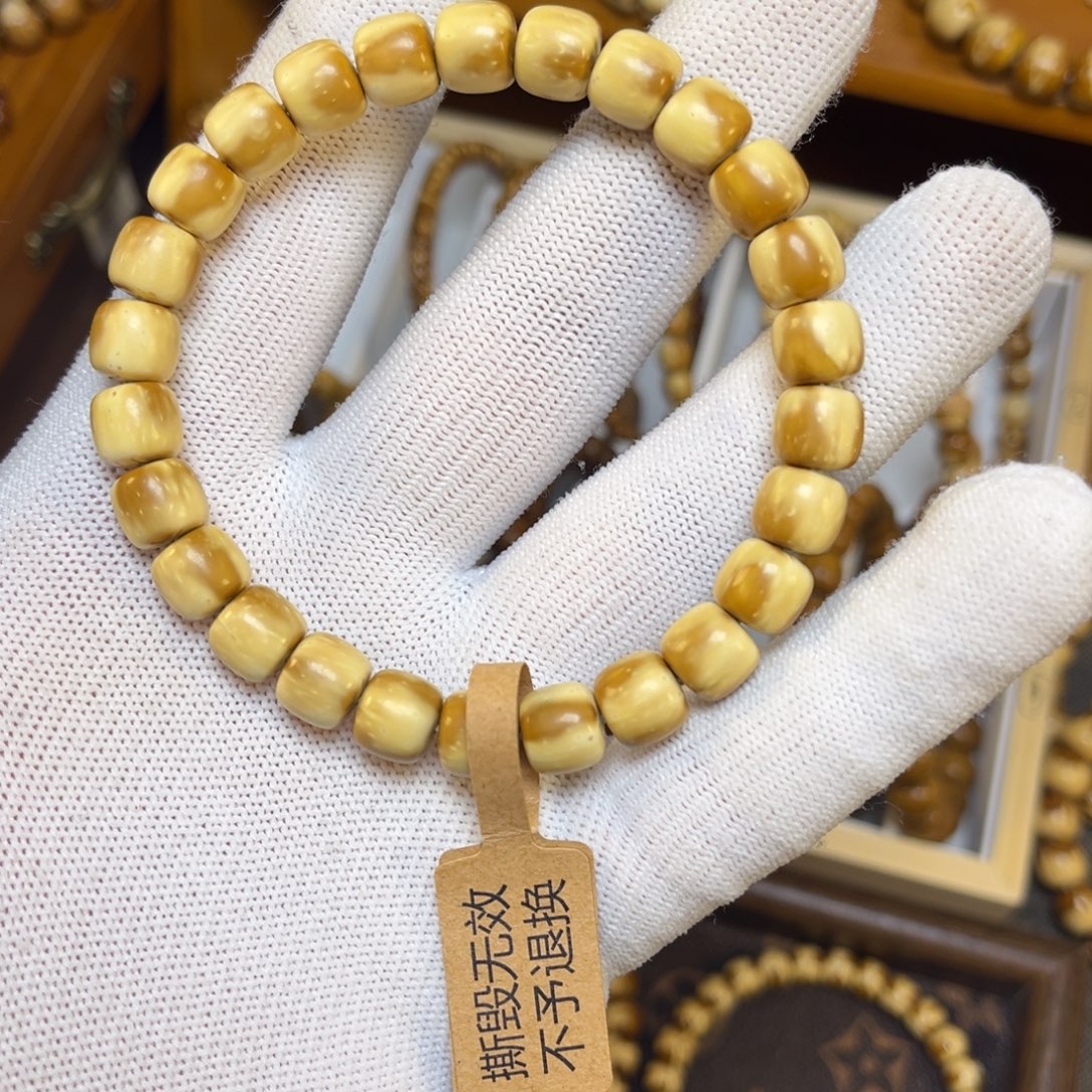 瑜***_手串紫金鼠卡9实心花皮