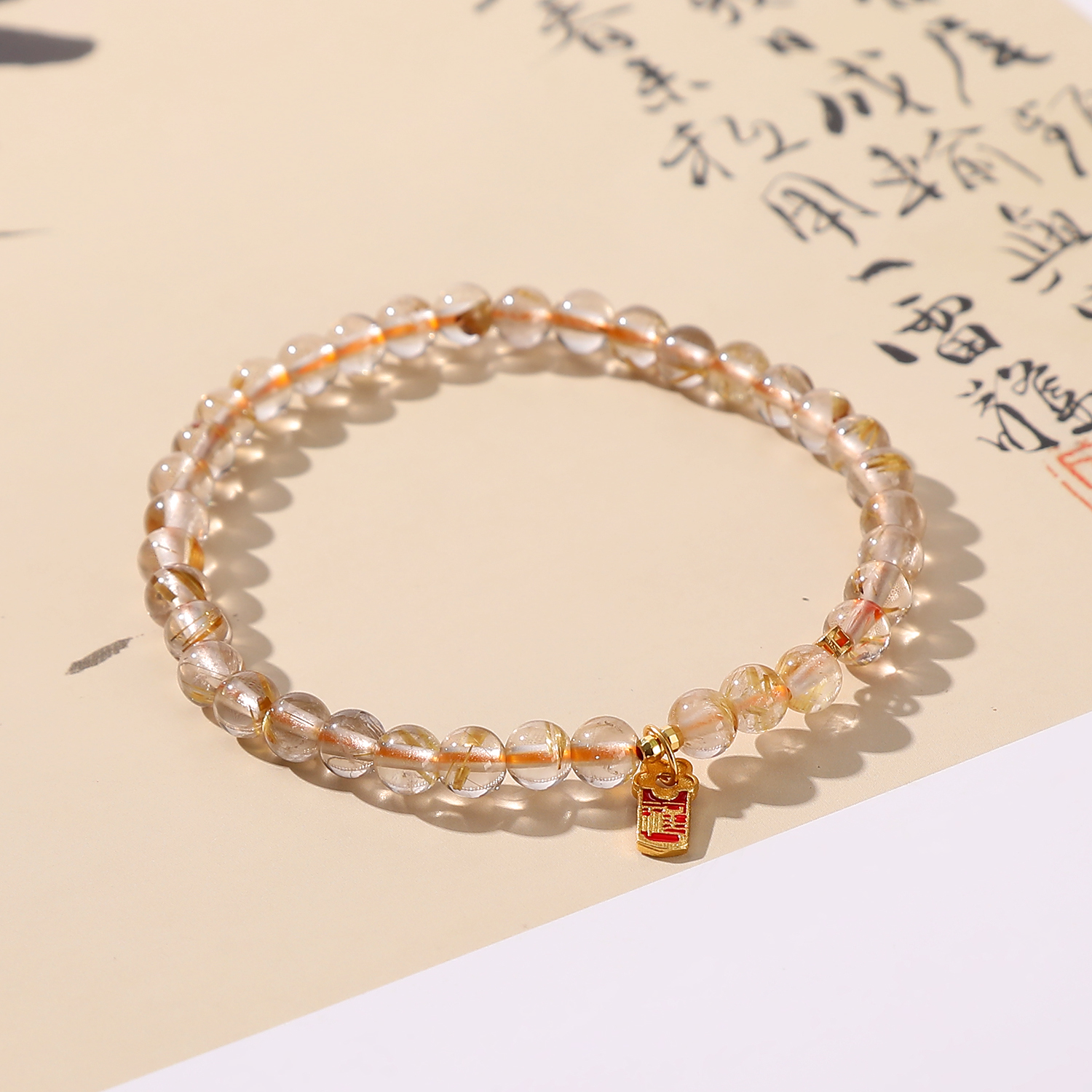 一了个卜【金色海岸】金发晶手串
