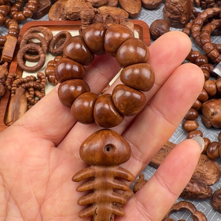 蔷***膀吊坠库克库克雕刻的小鱼骨