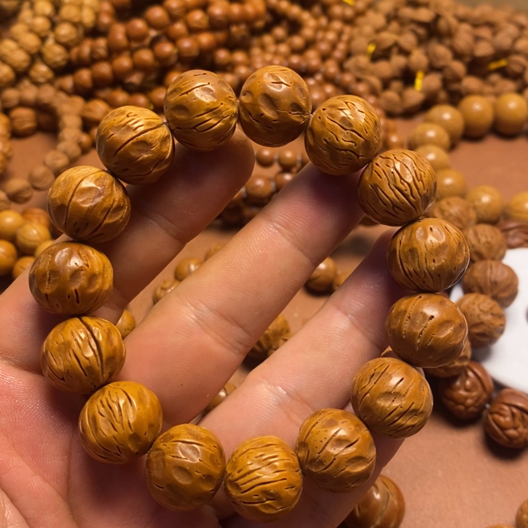 阿***。手串桃核竖纹无相