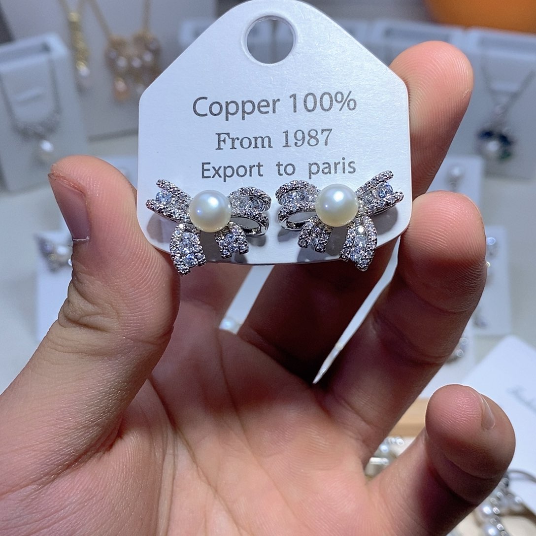 淡水珍珠银S925镶嵌耳饰