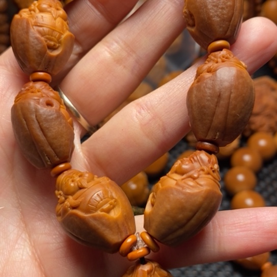 橄榄核吊坠包衣财神