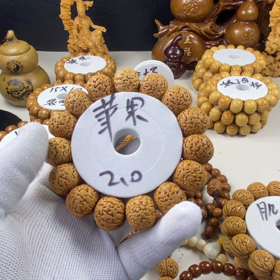 人***梦手串桃核桃核手串制作