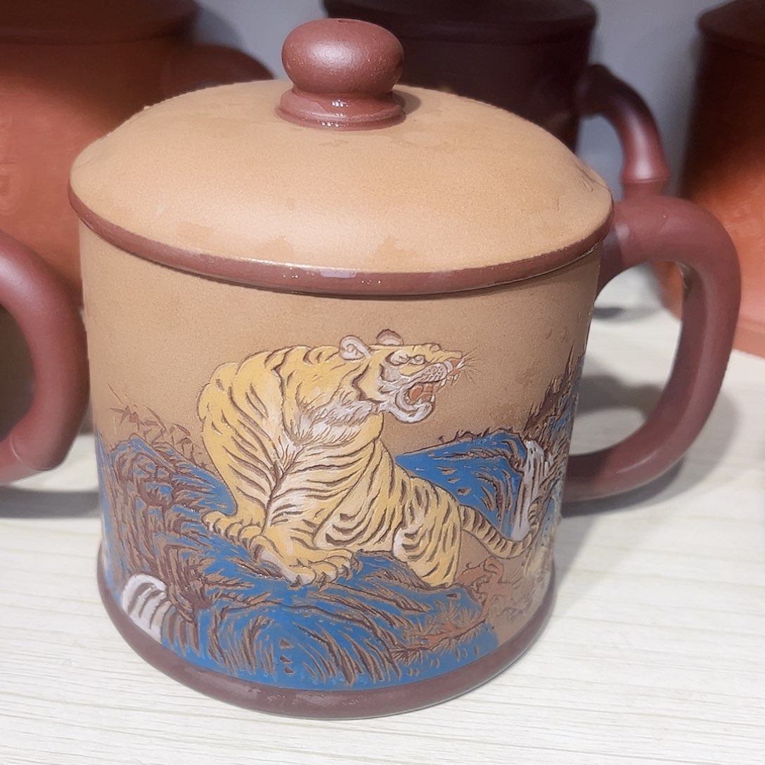 蓝***海紫砂茶杯手工制作