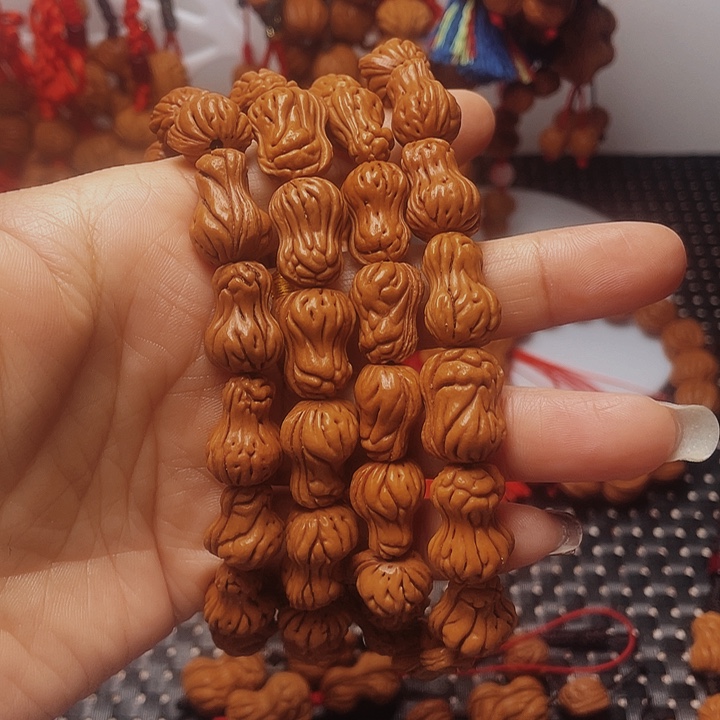 包***非木质类龙纹桃枭挂件