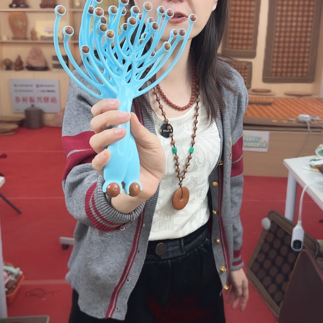 泗水砭石珊瑚梳子