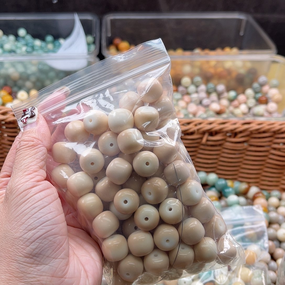 白玉菩提吊坠一*Q/14mm/50颗锅底