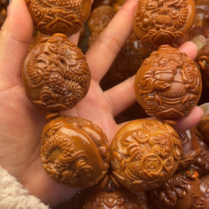 橄榄核吊坠从****_橄榄核