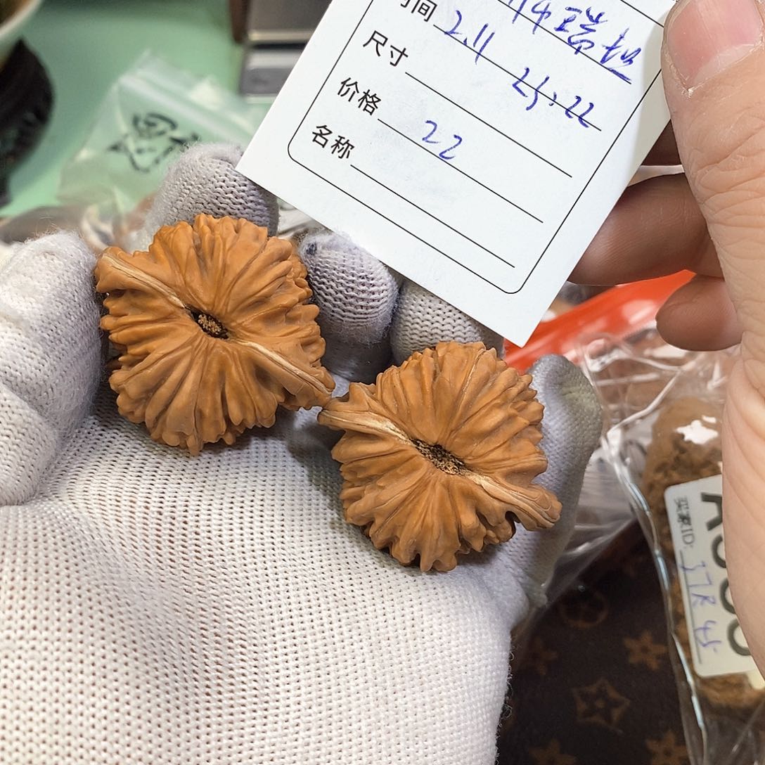 桃核把件晋****司四座楼。        