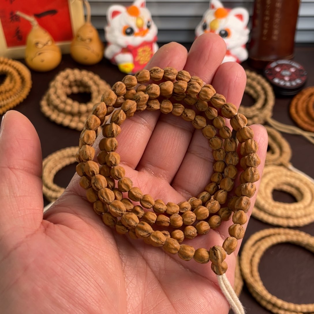 柏香籽/百香籽吊坠皓**心原桩红油皮 六耳猕猴