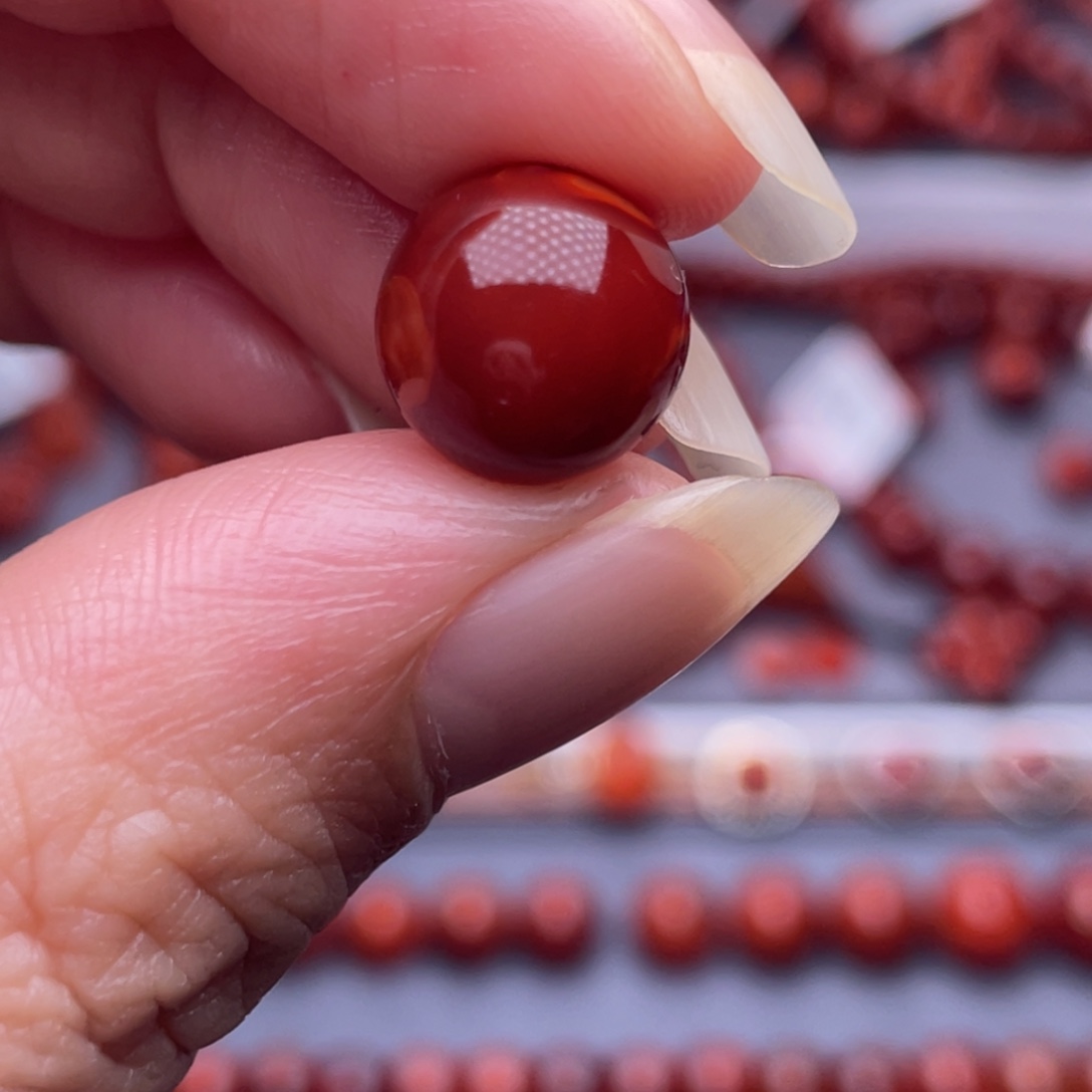李***听南红玛瑙未镶嵌配珠1.1mm瓦西牛血火焰单珠高品