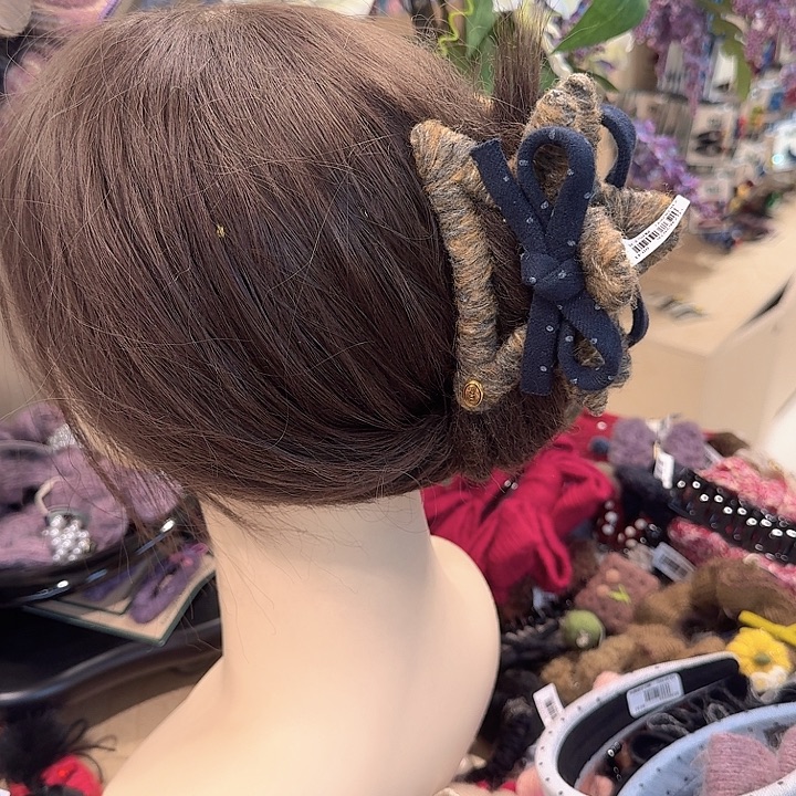 咖色星星蓝蝴蝶结抓夹