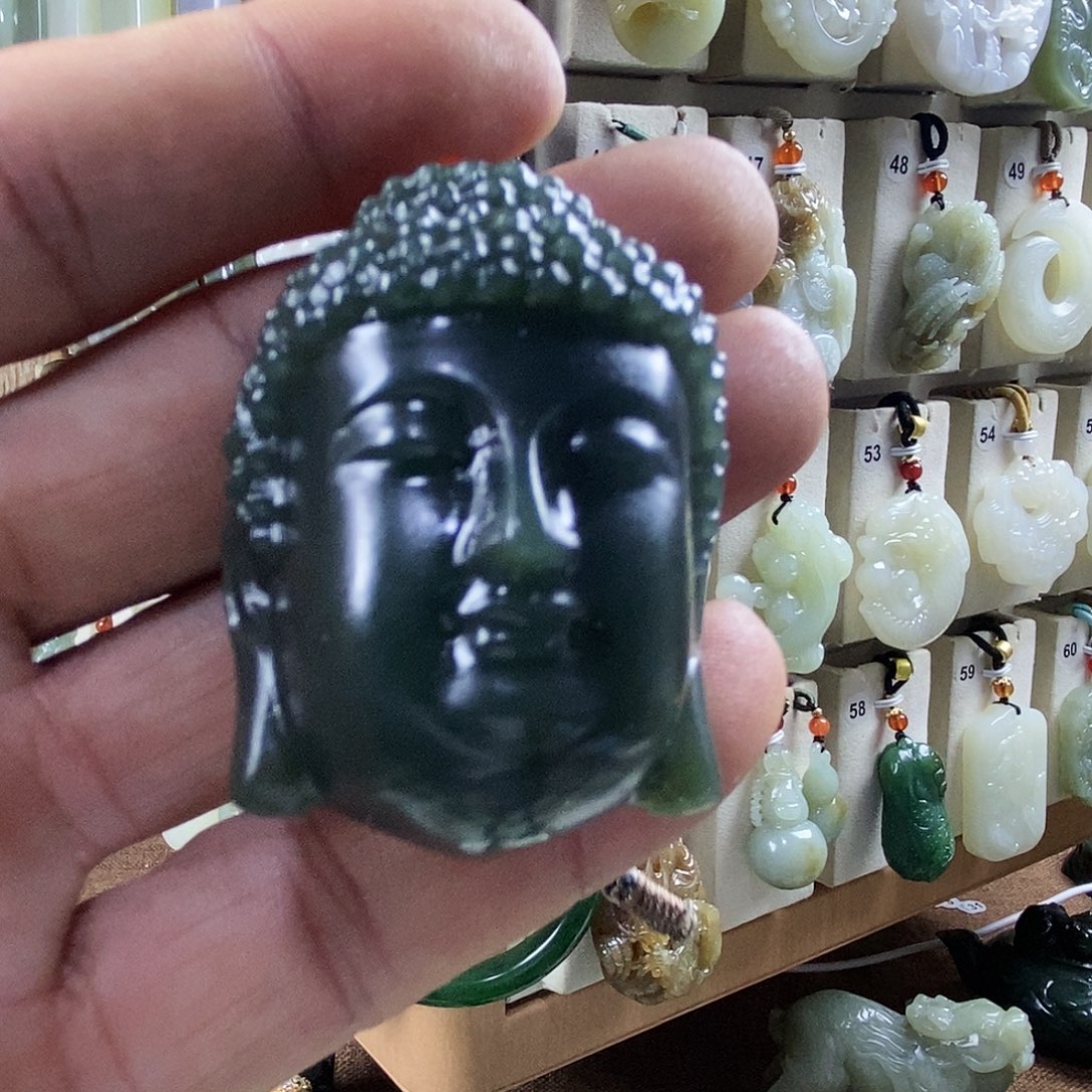 遗***角和田玉未镶嵌颈饰