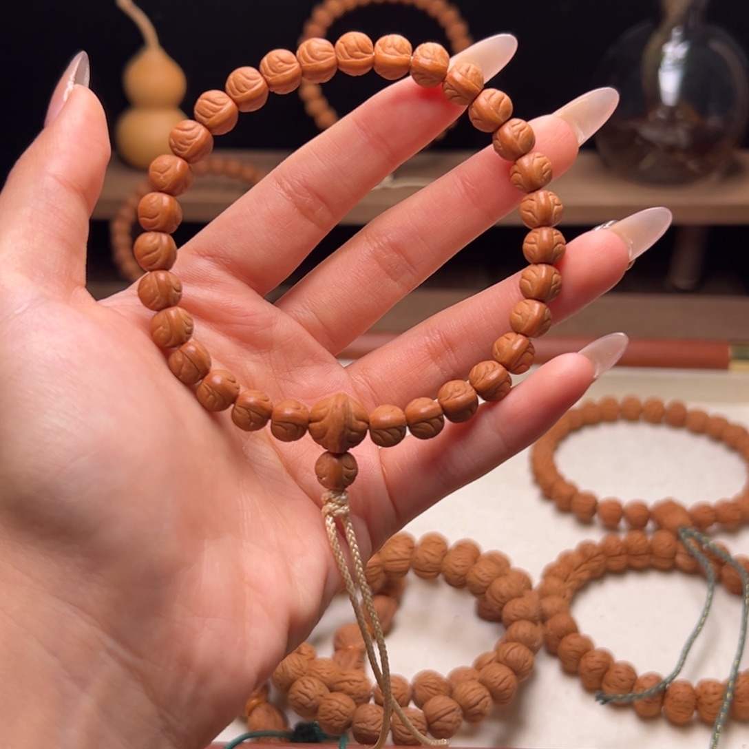 诸***遂木质类陕西龙纹桃核8.2