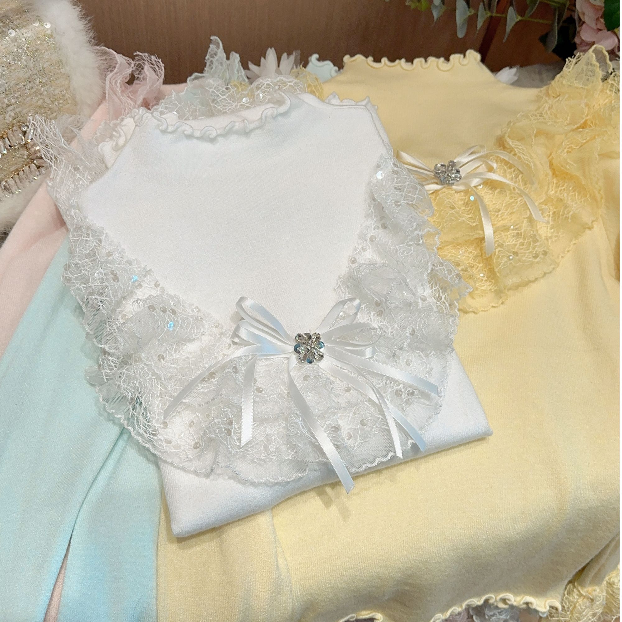 艾日秀2025春款粉色修身长袖上衣蕾丝亮片+蝴蝶结钻饰针织衫K0045