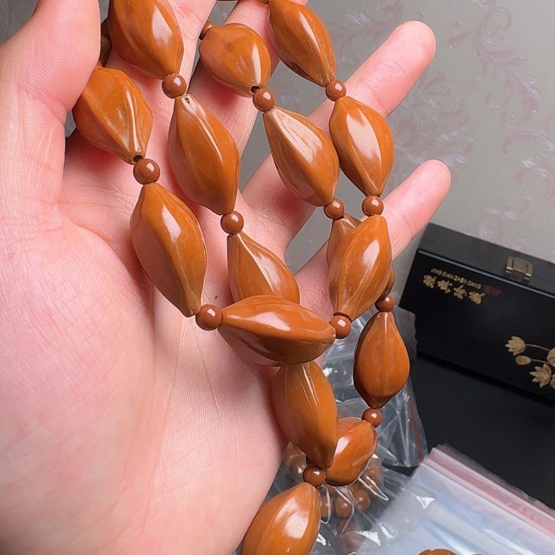 橄榄核手串哥几个