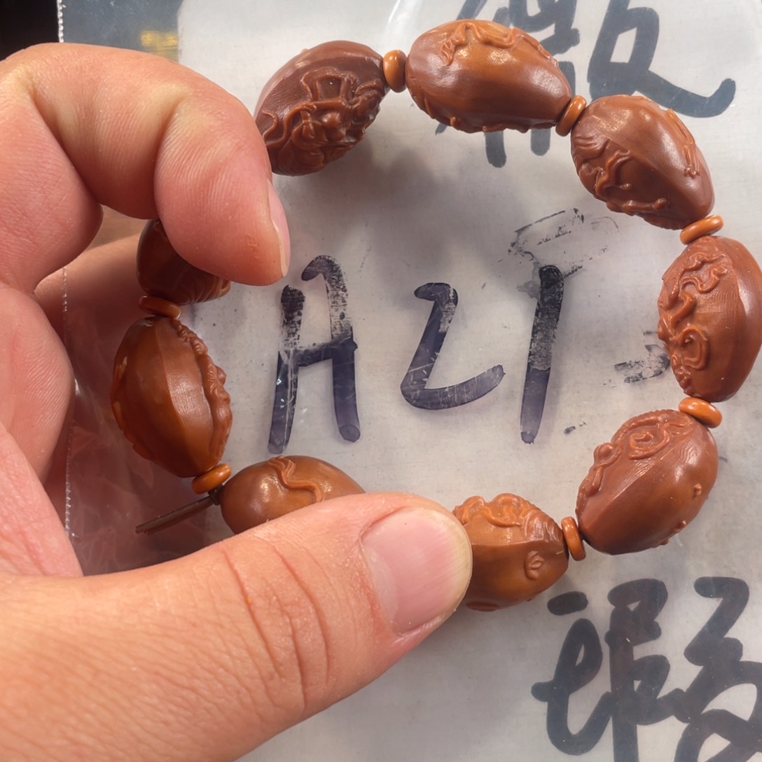 橄榄核其他橄榄核雕工艺手串 瑕疵介意勿拍