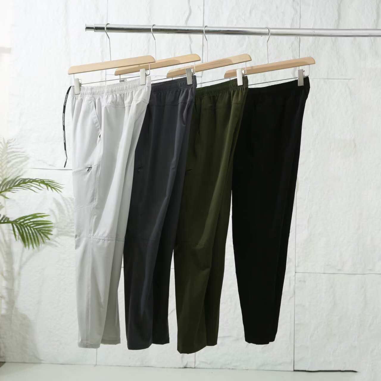 秋季新款男女款防水防风软壳弯刀直筒冲锋裤户外休闲高弹裤